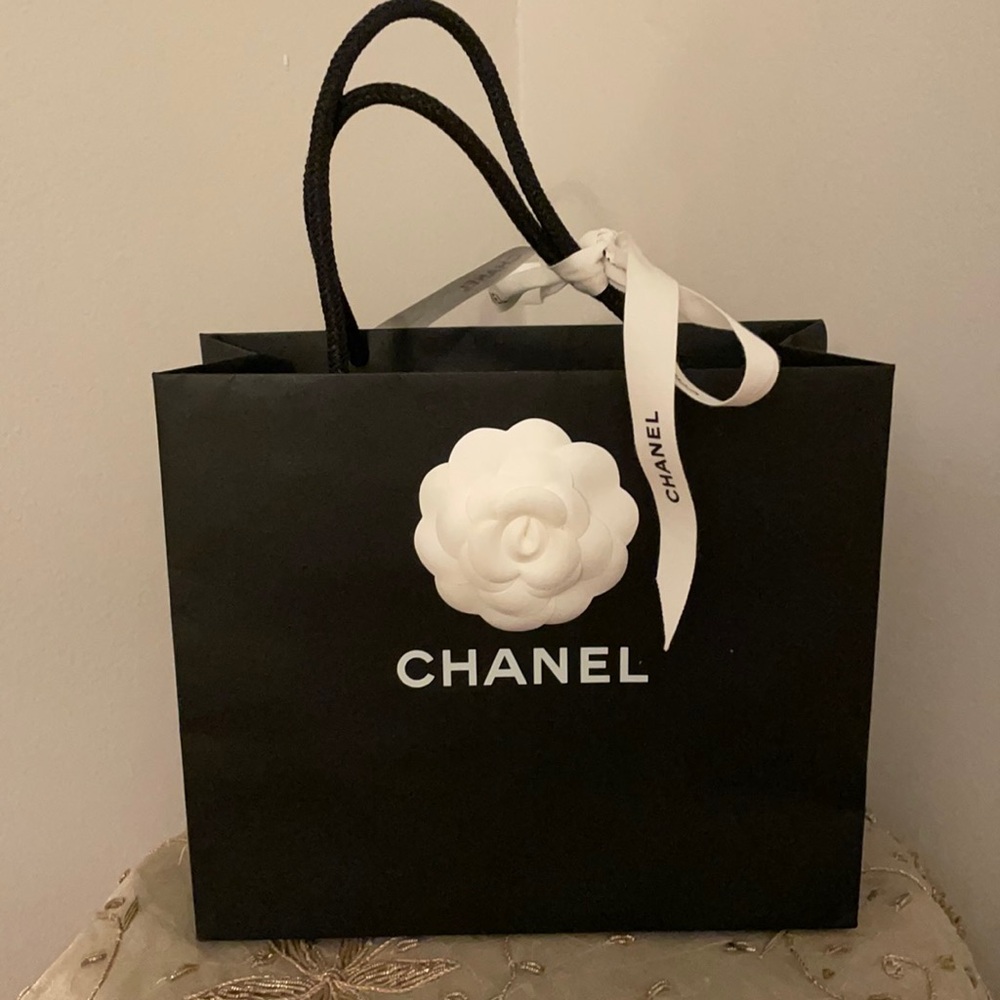 Chanel paper bag with flower and ribbon